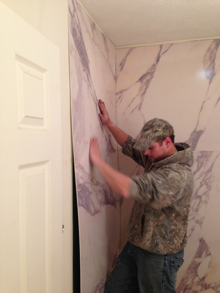 Installing decorative PVC wall panels | Innovate Building Solutions | #PVCPanels #WaterproofPanels #ShowerWallPanels #DIYBathroomPanels