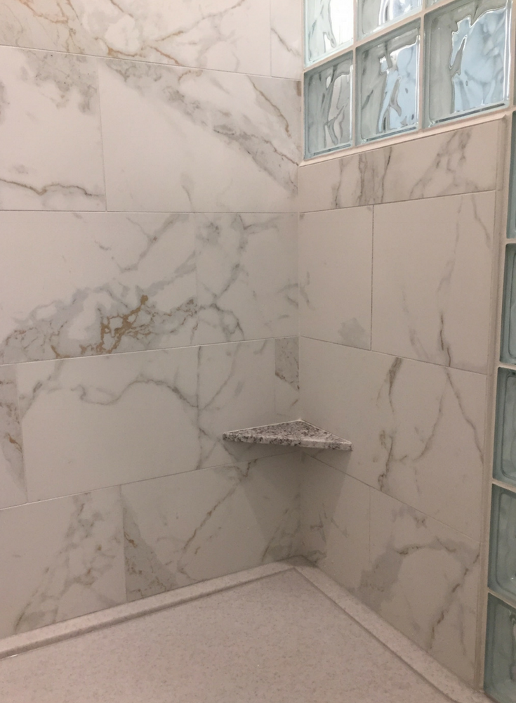 Of Shower Wall Panels Vs Tile, How To Install Large Tile On Shower Wall