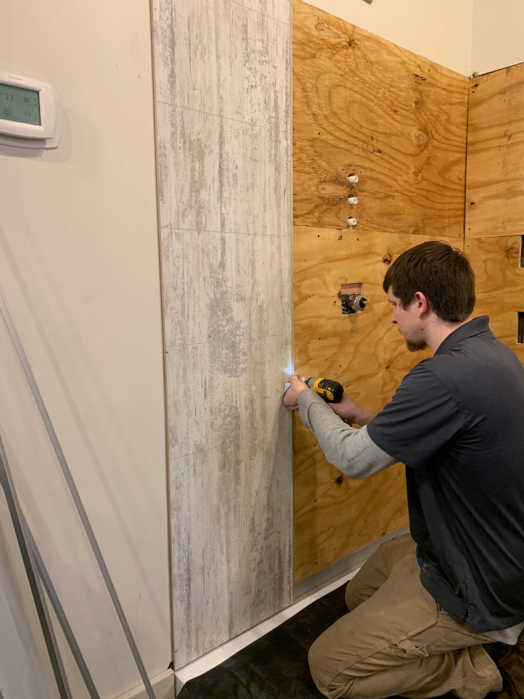 Laminate shower panels installed direct to stud on OSB | Innovate Building Solutions | #LaminateWallPanels #ShowerInstall #InstallingShowerPanels