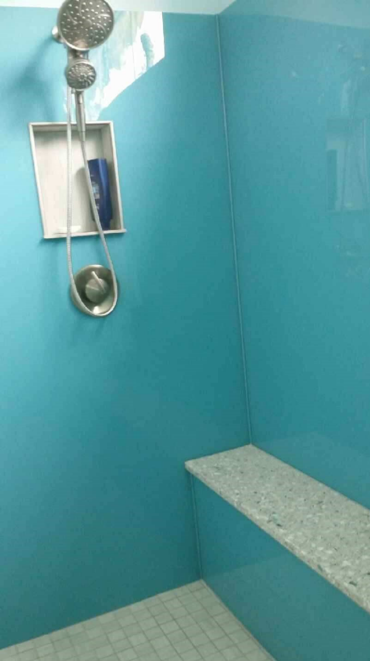Mistake 6 blue high gloss shower wall panels | Innovate Building Solutions | #BathroomRemodel #HighGlossPanels #BlueBathroom #BathroomDesigns