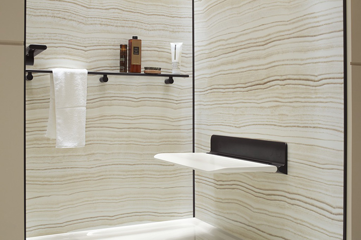 Fold down shower seat | Innovate Building Solutions | #FoldDownSeat #ShowerSeat #BathroomShower