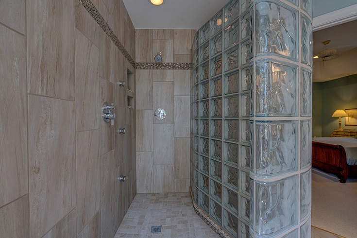 Completed glass block curved shower ready for tile base | Innovate Building Solutions | #CurvedGlassBlock #GlassBlockWall #Tileshower