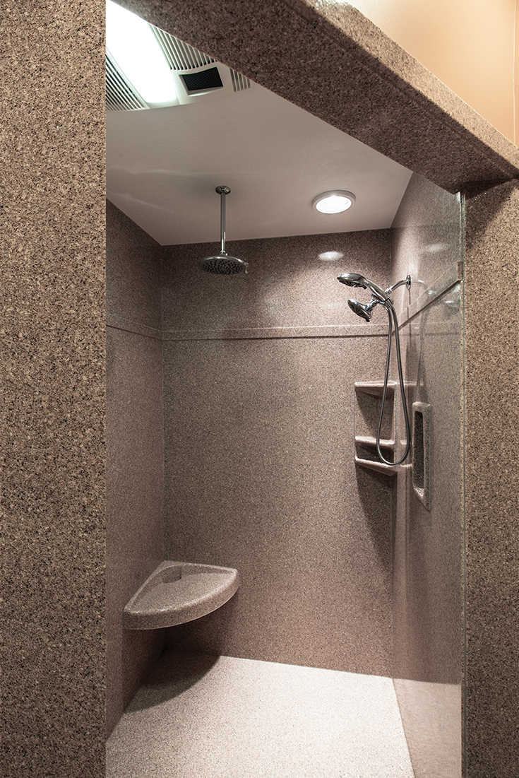 Cultured granite longer shower wall panels without seams | Innovate Building Solutions | #SolidSurface #WallPanels #culturedgranite #ShowerBase