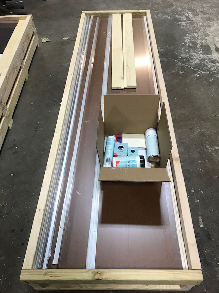 FIbo a laminate shower wall panel kit sealant trim ready for shipment | Innovate Building Solutions | #ShippingProducts #Wallpanels #BathroomRemodelDIY #DIYWallpanels