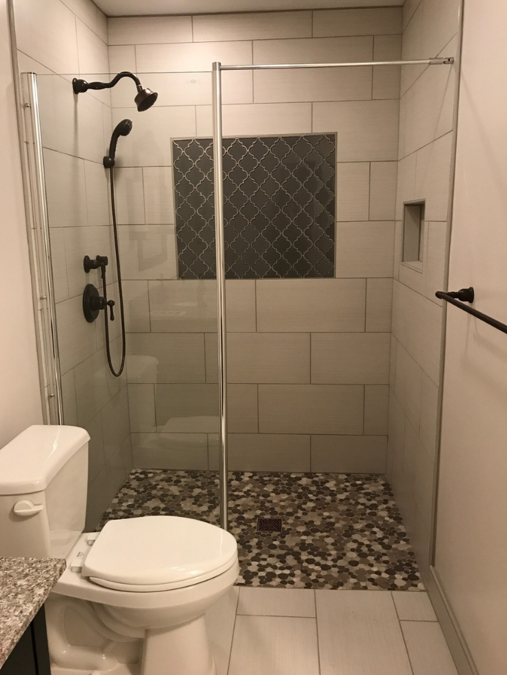 One level shower wet room in a 5' x 8' bathroom | Innovate Building Solutions | #Onelevelshower #WetRoom #TileShower #RollInShower