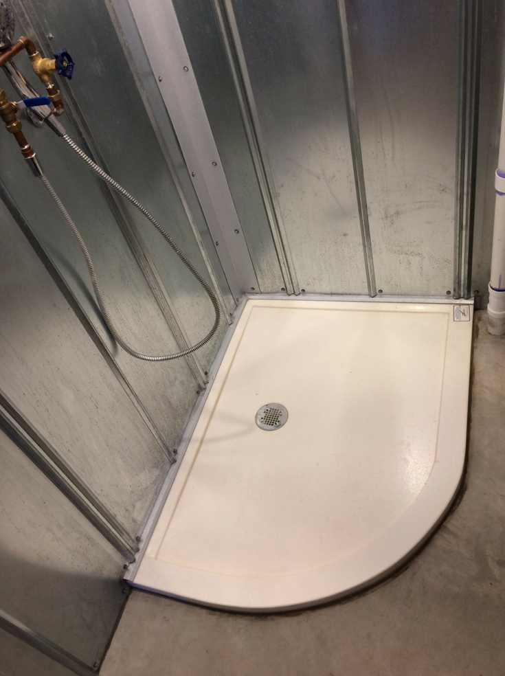 How to Compare Solid Surface & Cultured Stone Shower Systems