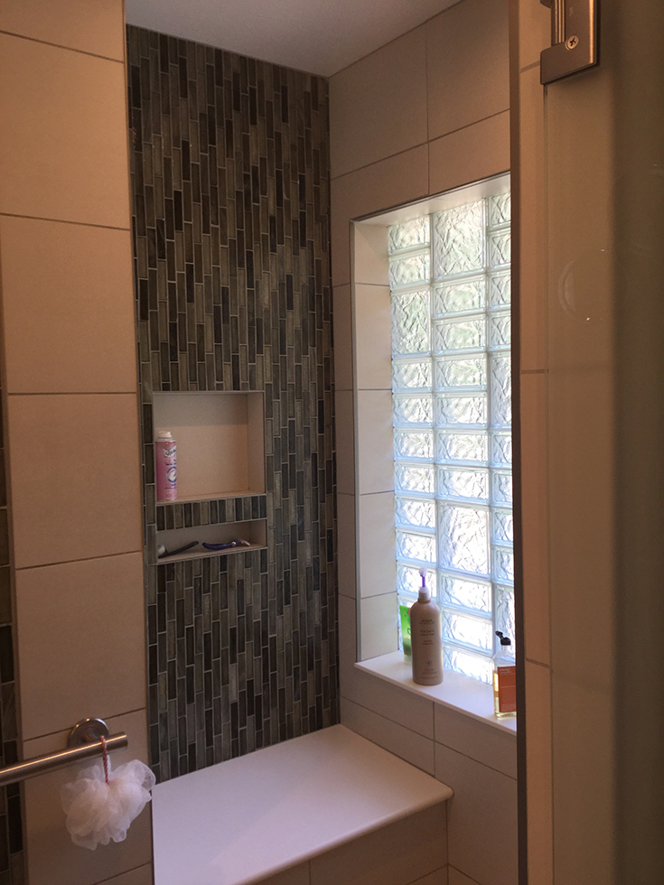 multi patterned glass block shower window | Innovate Building Solutions | #GlassBlock #GlassBlockShower #MultiPatternGlassBlock