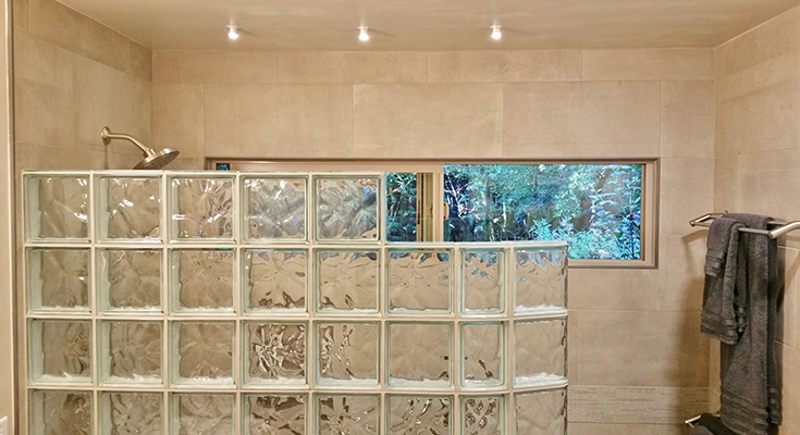 transom window and curved glass block shower wall | Innovate Building Solutions | #CurvedGlassBlock #TransomWindow #ShowerWindow