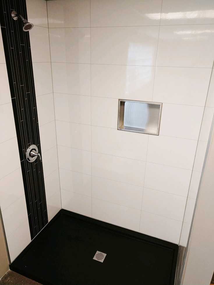 contemporary brushed nickel recessed niche in laminate shower wall panel system | Innovate Building Solutions | #LaminateShower #ShowerPanels #ShowerSystem