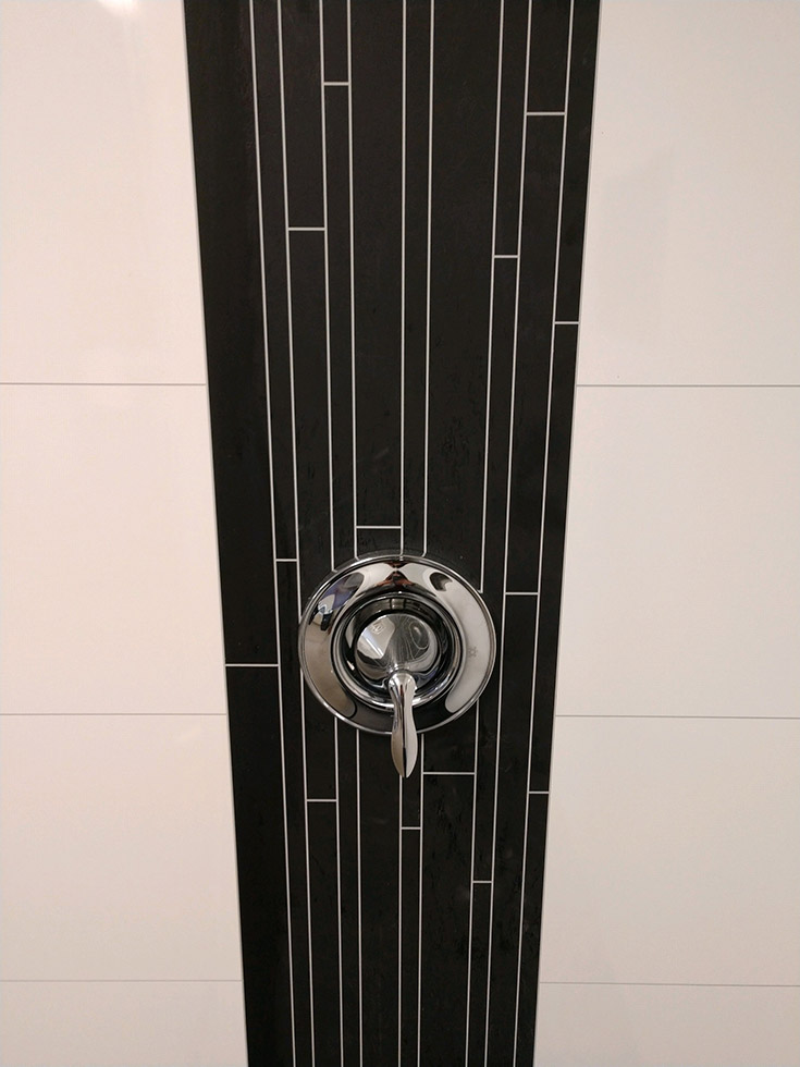 They're realistic close up laminate shower wall | Innovate Building Solutions | #DecorativeAccent #WallPanels #Showerwallpanels