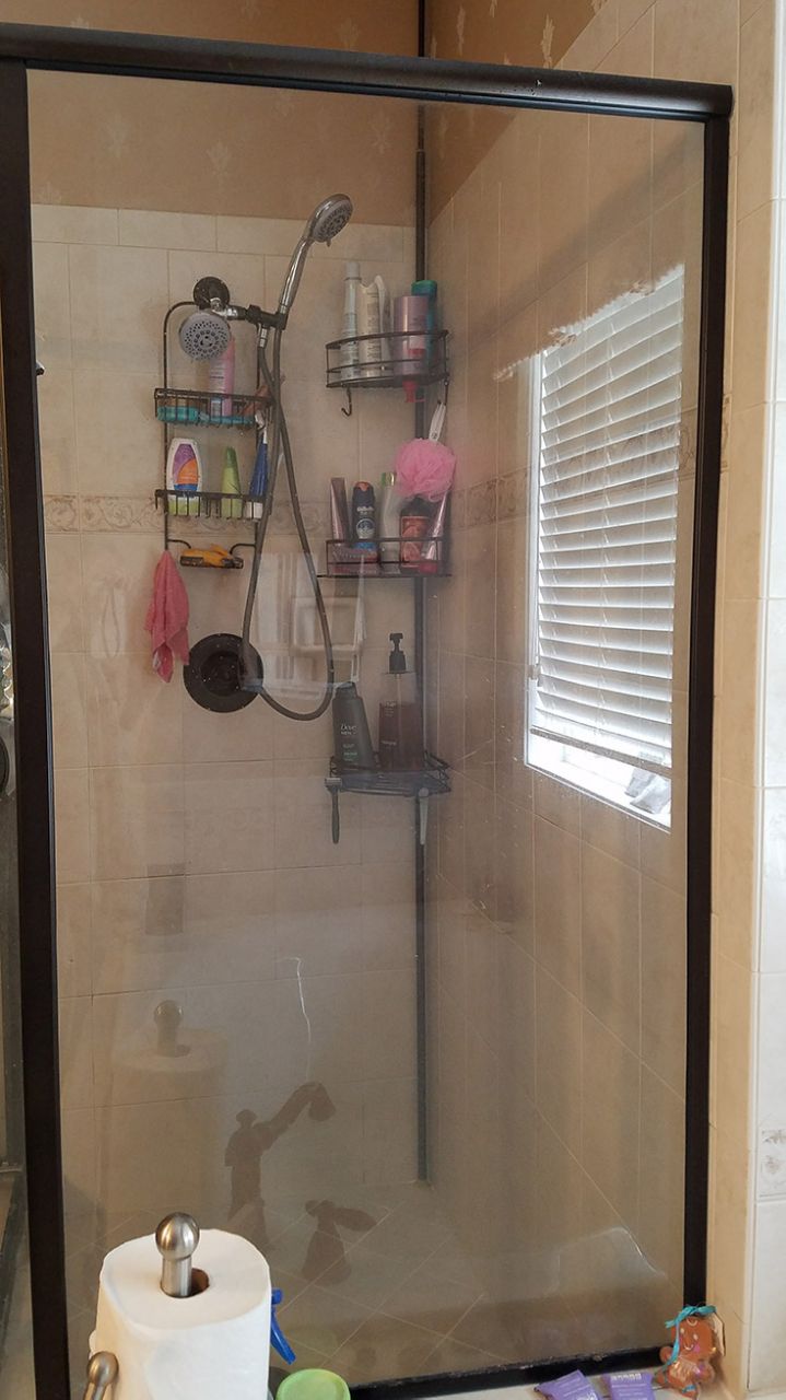 before picture of a stand up shower in North Carolina | Innovate Building Solutions | #OldShower #OutdatedShower #Moldyshower