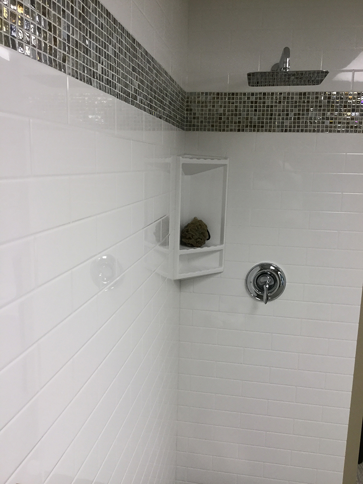 subway tile cultured granite solid surface shower wall panels | Innovate Building Solutions | #SolidSurface #CulturedGrantie #ShowerPan