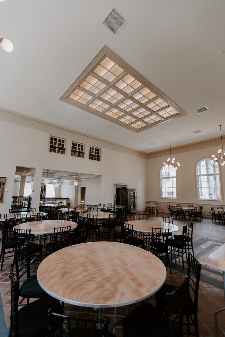 Fashionable dining and event room vaulted ceiling skylights palladium windows | Innovate Building Solutions | Skylights #VaultedCeiling DinningArea 