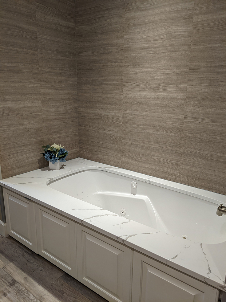 marina gray oak tub surround grout free panels | Innovate Building Solutions | #GroutFree #TubSurround #BathroomRemodel