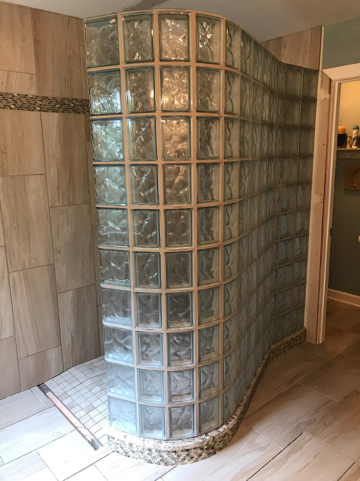 Smart idea 1 curved serpentine glass block shower ready for tile shower base after installation | Innovate Building Solutions | #Glass Block #Glassblockdesign #ShowerDesign