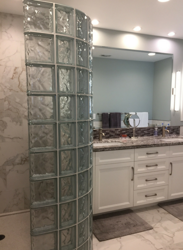 Feature 1 both love double vanity around a glass block walk in shower | Innovate Building Solutions | #GlassBlock #Vanity #DoubleVanity #BathroomRemodel