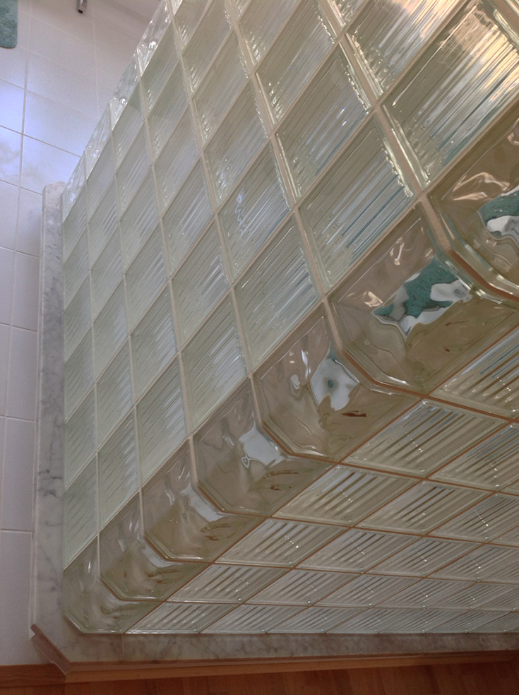 Shape 2 different pattern corner glass block in a shower Columbus Ohio | Innovate Building Solutions | #glassblock #Cornerblock #VeerGlassBlock #90degreeangle