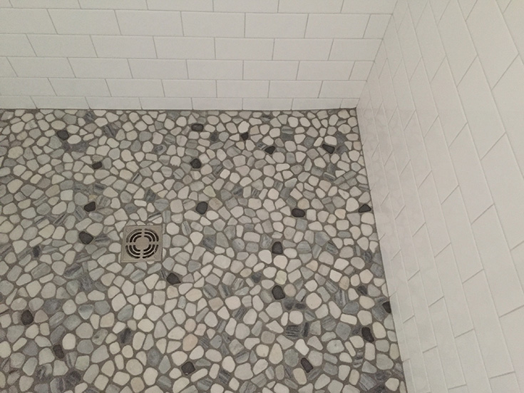 Tip 4 Look 2 pebble tile shower floor with a custom pan | Innovate Building Solutions #TileShower #Showerfloor #ShowerBase 