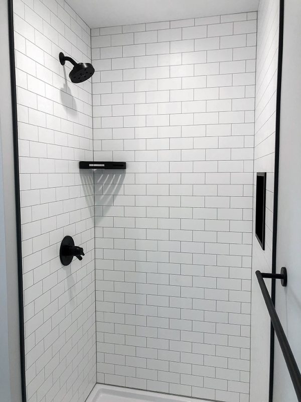 How to compare laminate vs. PVC composite shower and tub wall panels
