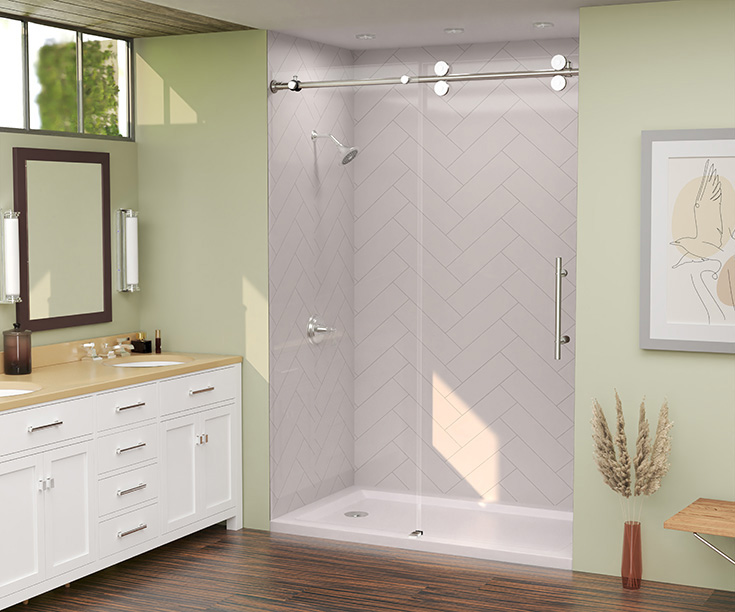 Pro 1 alcove shower with white herringbone laminate shower wall panels frameless glass shower door | Innovate Building Solutions #Alcoveshower #Whatisanalcoveshower #showerAlcove #dooralcove