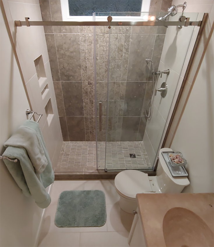 Pro 5 alcove shower in a 5' x 8' bathroom credit www.markdebow.com | Innovate Building Solutions #AlcoveShower #Showerdoor #Framelessglassdoor #SlidingDOor