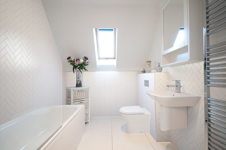 Reason 6 short - white herringbone laminate bath and shower wall panels | Innovate Building Solutions #WhiteHerringbone #Laminatewallpanels #Showerwallpanels