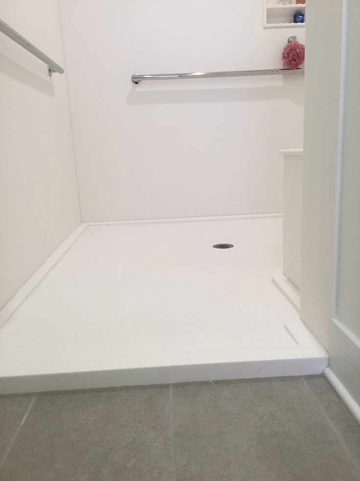 Design factor 2 low profile offset solid surface shower pan | Innovate Building Solutions #ShowerPans #ShowerBases #BathroomRemodel