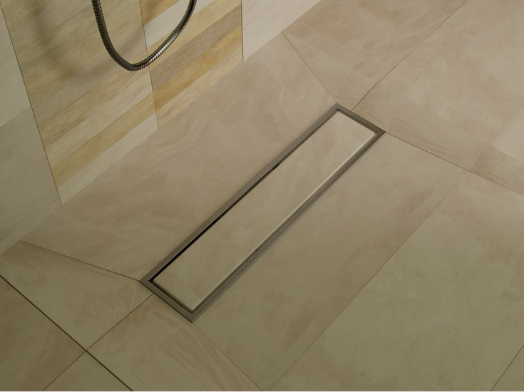 https://blog.innovatebuildingsolutions.com/wp-content/uploads/2022/02/Design-factor-8-large-format-tile-with-a-linear-tile-drain.png