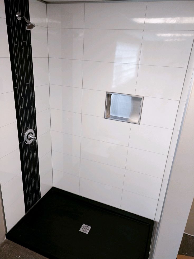 Idea 4 brushed stainless steel recessed niche in laminate shower wall panels | Innovate Building Solutions #ShowerWalls #ShowerAccesories #ShowerNiche