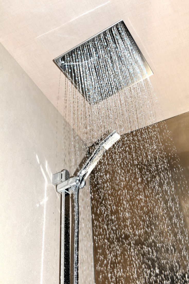 Idea 5 ceiling mounted shower head for tall people in a shower | Innovate Building Solutions #ShowerRemodel #MountedShowerHead #BathroomRemodel