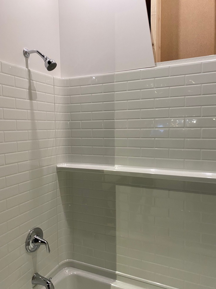 Trend 8 new construction shower with more shelving | Innovate Building Solutions #ShowerSystem #ShowerRemodel #BathroomDesign