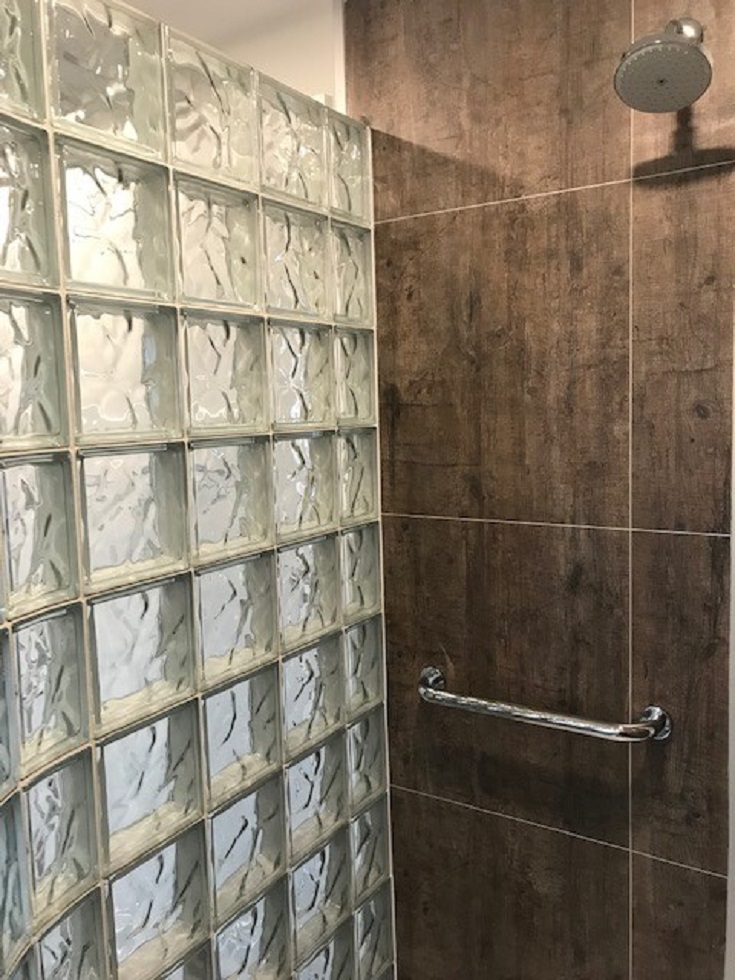 Trend 9 rough wood laminate shower wall | Innovate Building Solutions #ShowerWallPanels #LaminatedWallPanels #ShowerWalls