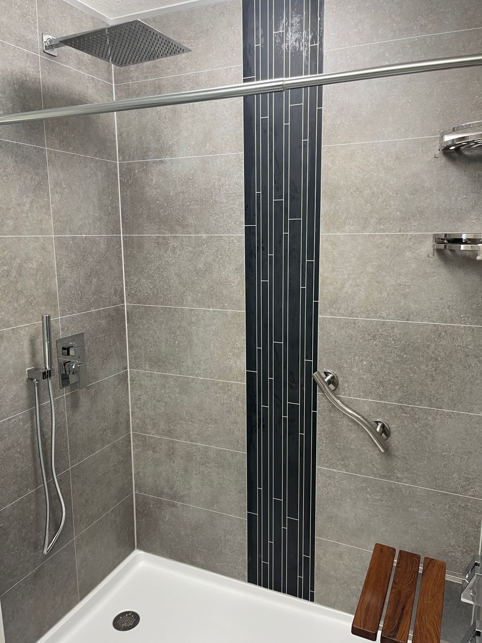 Strategy 3 grout free shower surround laminate wall panels with an accent trim | Innovate Building Solutions #LaminateShowerWallPanels #ShowerWallPanels #ShowerReplacementKit
