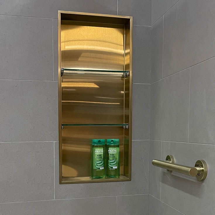 Factor 15 oversized champagne bronze recessed tub niche | Innovate Building Solutions #Niche #OversizedRecessedNiche #ShowerAccessories