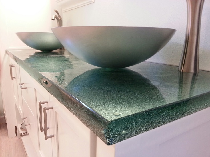Factor 10 glass bathroom countertop with a vessel sink bowl Innovate Building Solutions #GlassCountertops #GlassVanityCountertops #VanitySinks