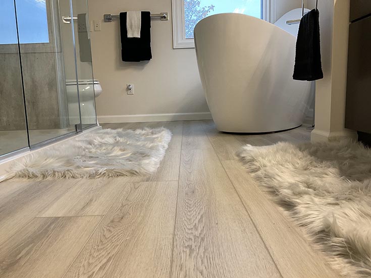 Better flooring luxury vinyl plank for age in place | Innovate Building Solutions | Vinyl Flooring for bathroom design | Shower design ideas for bathroom remodeling | Cleveland Remodeling designs
