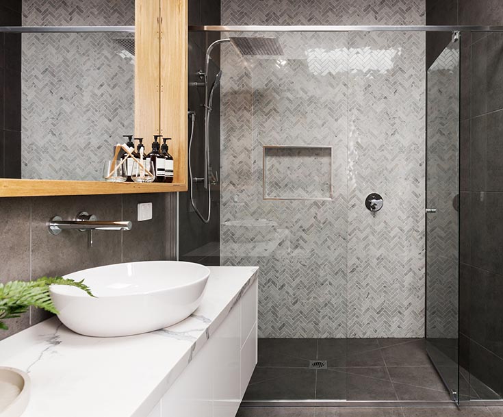 Option 2 ceramic tile shower wall surrounds herringbone | Innovate Building Solutions | Cleveland Bathroom Remodel | Home Design Ideas | Ceramic Tile Benefits