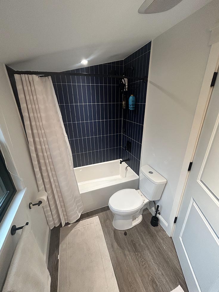 Disadvantage 1 smokey blue stacked subway tub wall panels | Innovate building solutions | Bathroom remodel ideas | DIY Bathroom