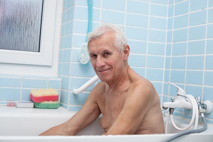 Reason 1 good idea - senior man in a bathtub showers are safer | Innovate building solutions | Shower Tub | walk in shower | grab bar shower design | Age in place bathroom