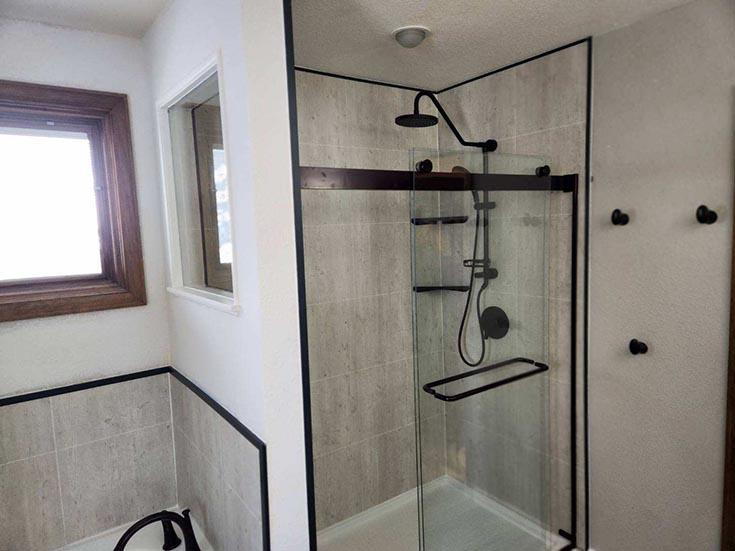 Fact 2 wood look avalon pine laminate shower panels black trim | innovate building solutions | Bathroom products | Bathroom remodeling ideas