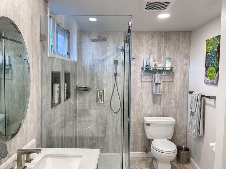 Pro 3 laminate shower panels behind clear glass shower door | Innovate building solutions | Cleveland glass block | Glass Shower Doors | Cleveland Bathroom Remodel