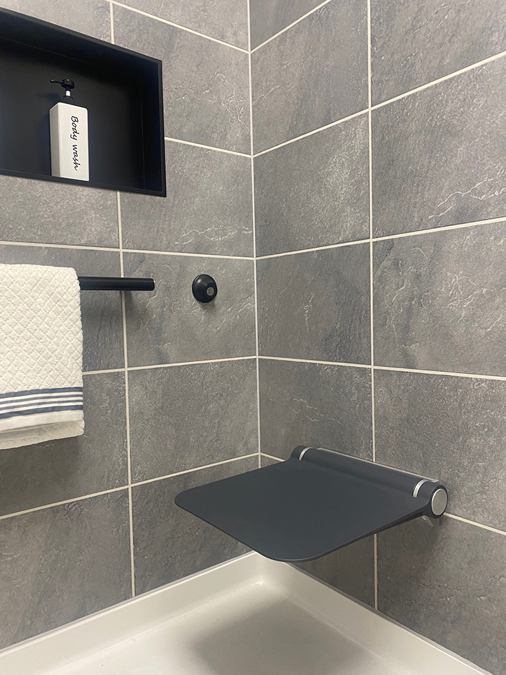 FAQ 6 - 3 - black fold down seat age in place shower - Innovate Building Solutions, Bathroom Accessibility Tips, Shower Improvement Project, Shower Accessories, Safer Bathroom Renovation