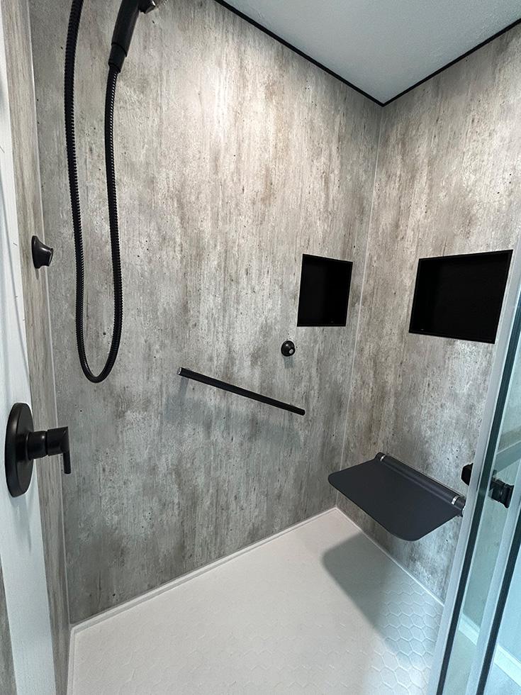 Tip 5 black fold down shower seat cracked cement wall panels - Innovate Building Solutions, Fold Down Shower Seats, Bathroom Shower Accessories, Bathroom Design Ideas, Shower Renovation Concepts