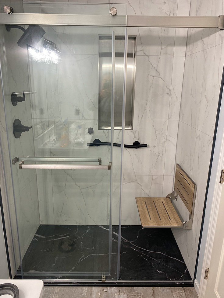 Secret 8 weathered teak fold down seat low profile black marble shower pan - Innovate Building Solutions, Accessible Shower Needs, Age In Place Shower Accessories, Fold Down Shower Seats, Walk In Shower Accessories