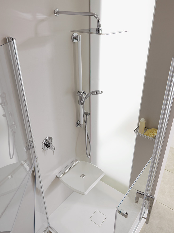 Step 2 white ABS plastic fold down shower seat - Innovate Building Solutions, Cleveland Ohio Shower Needs, Shower Accessibility Options, Walk In Shower Accessories, Custom Bathroom Showers