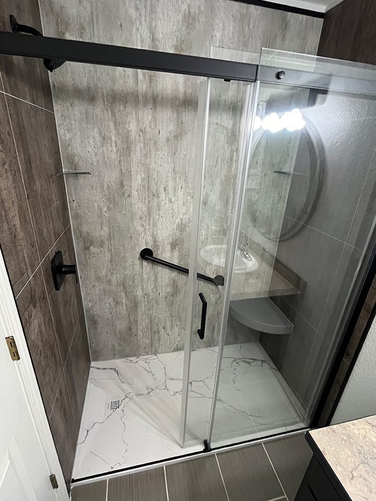FAQ 2 grab bar at an angle credit Missoula Remodeling - Innovate Building Solutions, Bathroom Shower Accessories, Shower Grab Bar Options, Bathroom Accessibility Help, Modern Bathroom Showers