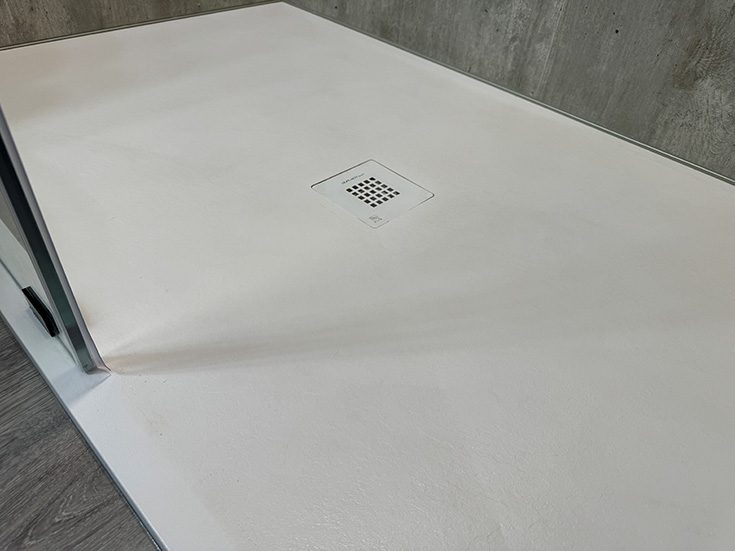Feature 3 close up safe textured age in place stone shower pan - Innovate Building Solutions, Cleveland Ohio Shower Remodels, Bathroom Renovation Products, Walk In Shower Remodels, Shower Pan Options