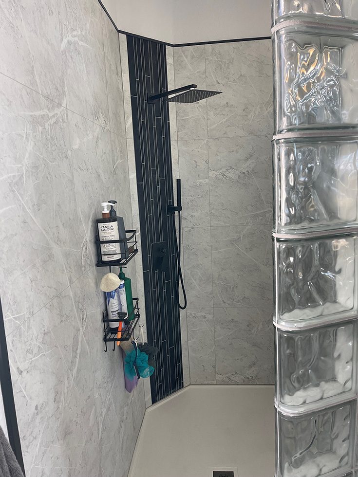 Reason 6 custom Fibo shower with black accent panel and custom shower pan - Innovate Building Solutions, Walk In Shower Remodeling, Bathroom Shower Wall Panels, Custom Bathroom Renovation Products, DIY Bathroom Shower Remodeling