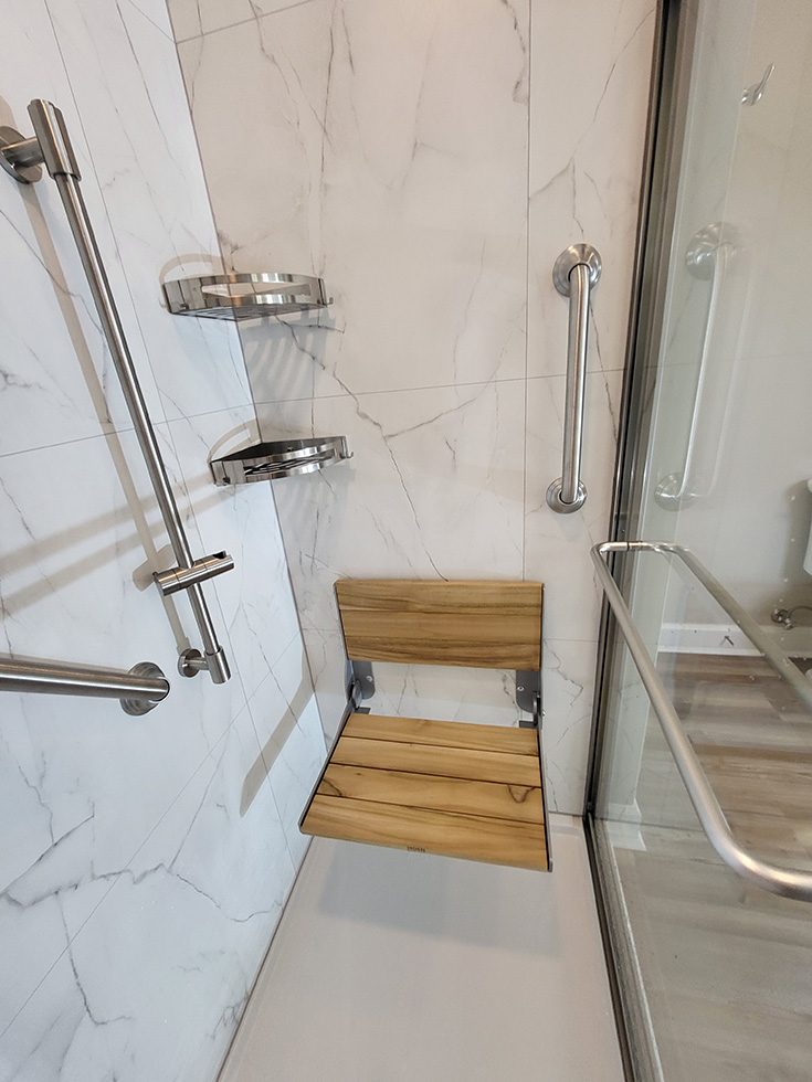 Regret 10 fold down shower seat small shower - Innovate Building Solutions, Westerville Ohio Custom Showers, Accessible Walk In Showers, Modern Bathroom Shower Accessories, Fold Down Shower Seats
