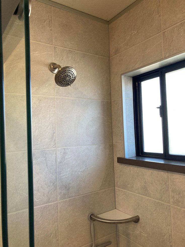 Worry 8 window in a shower with grout free wall panels - Innovate Building Solutions, Cleveland Ohio Luxury Home Showers, Shower Replacement Kits, Custom Shower Renovations, Shower Design Ideas